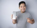 Man Presenting Smart Phone Mock Up Royalty Free Stock Photo