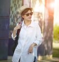 portrait of younger asian woman wearing straw hat and sun glasses relaxing traveling Royalty Free Stock Photo