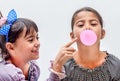 Portraits of beautiful little girls blowing bubbles Royalty Free Stock Photo