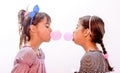 Portraits of beautiful little girls blowing bubbles Royalty Free Stock Photo