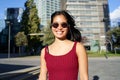 Portraits of a charming Asian Woman looking at the camera with sunglasses. Girl posing for the camera in the