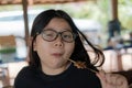 Portraits Cute Asian Thai Girl eats grilled pork with deliciousness exciting action