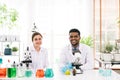 Portraits of a diversity of scientists smile and look at the camera in a research laboratory. Group of chemistry students working Royalty Free Stock Photo