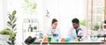 Portraits of a diversity of scientists working together in a research laboratory. Group of chemistry students working. Royalty Free Stock Photo