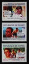 Portraits of Indurain, Hinault and Lemond on postage stamps