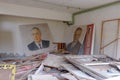 Portraits of the leaders of the Soviet Union in an abandoned room in Pripyat. A pile of