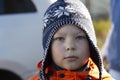 Portret of a boy is wearing a hat