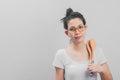 Beautiful Asia Thai Woman Poses with cooking equipment on white