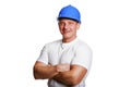 Portriat of man with helmet, worker white shirt.