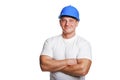 Portriat of man with helmet, worker white shirt. Crossed arms. Royalty Free Stock Photo