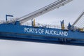 Ports of Auckland sign on container crane