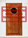 Ports closed to cruise ships to due the pandemic stamp on cruise ship in background. Concept image