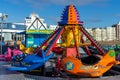 A child`s airplane ride at the fair, fairground or amusement park or funfaier Royalty Free Stock Photo