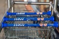 08/02/2020 Portsmouth, Hampshire, UK A close up of the handles of Tesco shopping trolleys or shopping carts in a trolley park shot