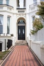 An entrance to an old victorian building