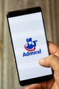 02-24-2021 Portsmouth, Hampshire, UK A mobile phone or cell phone being held by a hand with the admiral insurance app open on