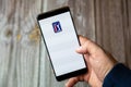 02-10-2021 Portsmouth, hampshire, UK A mobile phone or cell phone being held by a hand with the PGA tour app open on screen