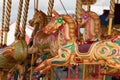 The painted horses on a traditional english carousel ride Royalty Free Stock Photo