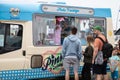 08/04/2019 Portsmouth, Hampshire, UK people queuing to buy an ice cream from an ice cream van Royalty Free Stock Photo