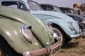 A row of old or vintage VW or Volkswagen bettle cars ata car show Royalty Free Stock Photo