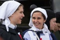 Two young women dressed in wartime nurses uniforms