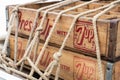 Vintage wooden 7up crates tied with rope