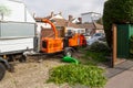 09/29/2020 Portsmouth, Hampshire, UK A wood chipper machine being used in the garden of a home by a tree surgeon