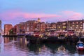 Portsmouth waterfront under colourful sky at dusk