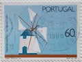 PORTUGAL - CIRCA 1989 : a postage stamp printed in the Portugal showing a traditional windmill with white covering Text: Santiago
