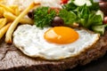 Portugal dish Bitoque made from beef steak with a fried egg, rice, french fries and vegetables Royalty Free Stock Photo