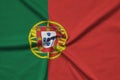 Portugal flag is depicted on a sports cloth fabric with many folds. Sport team banner Royalty Free Stock Photo