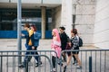 Portugal, Lisbon 29 april 2018: company of friends or group of people or kids or teenagers walk down by street