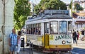 Old yellow vintage tram on the street of Lisbon Royalty Free Stock Photo