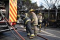 Portugal, Odivelas 07 September 2022 Rescue Team of Firefighters Arrive on the Car Crash fired passenger bus Traffic Royalty Free Stock Photo