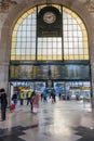 Portugal, Porto - 10/22/2018: central railway station with timetable, clock and tourists. Hall of famous Sao Bento train station. Royalty Free Stock Photo