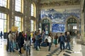 Travelers in historic train station Sao Bento in Porto