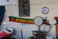 Portugal Scarf, Food Scale, Watch and Price List on White Tile Wall inside Antique Bolhao Market: in Porto, Portugal