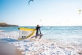 Portugal, Sintra, August 2022 Praia da Guincho Foil surfer going hydrofoil surfing in the sea on a bright sunny day