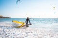 Portugal, Sintra, August 2022 Praia da Guincho Foil surfer going hydrofoil surfing in the sea on a bright sunny day