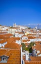 Portugal Travel Destinations. Sunny Picturesque Line of Traditional Tiled Rooftops of Lisbon City in Portugal At Daytime