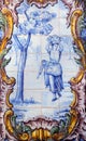 Portugal. Typical historical ceramic `azulejo` tiles depicting farm workers harvesting.