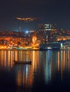 Portugalete at night with city lights and reflections