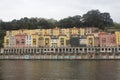 Portugese colored houses next to the water