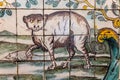 Portugese glazed ceramic tiles showing hunting scene, on display in the National Museum of Tiles in Lisbon, Portugal