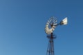 Portuguese ancient windmill. Isolated on blue