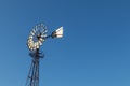 Portuguese ancient windmill. isolated on blue sky