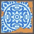 Portuguese azulejo vintage ceramic tile pattern. Old grunge background with chipped enamel tile. Italian pottery or