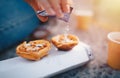 Portuguese Cake - Pasteis de Belem or Nata. Pasteis de Belem with Sugar Powder and Cinnamon