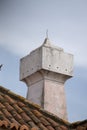 Portuguese chimney on a red tile roof Royalty Free Stock Photo