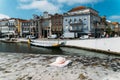 Portuguese delicacy called Ovos Moles made of egg yolks and sugar on the water channel background in Aveiro city